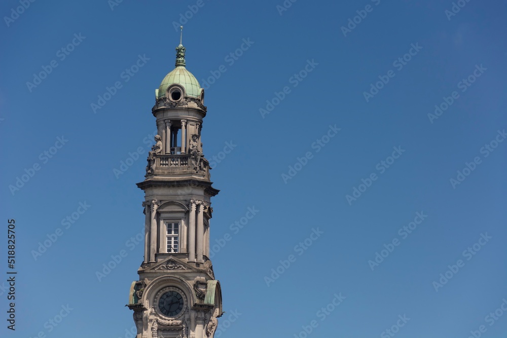 Coffee Stock Exchange. Santos, Brazil.  Clock tower of the building in the downtown of the city. Blue sky background. space for text. 