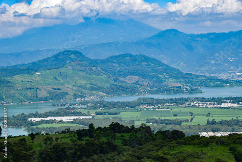 Panoramica del Lago de Amatitlan en Guatemala, al fondo el Volcan de Agua. photo