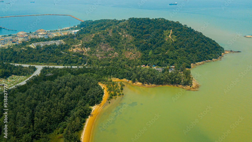 Aerial drone view of a famous hiking hilltop in Pantai Marina Telaga Simpul, Kemaman, Terengganu, Malaysia.