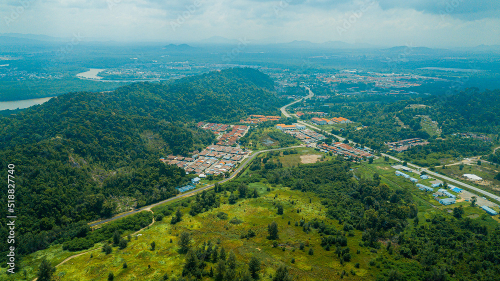 Fototapeta premium Aerial drone view of small town area in Pantai Marina Telaga Simpul, Kemaman, Terengganu, Malaysia.