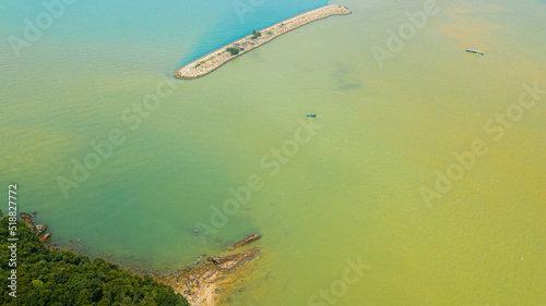 Aerial drone view of a seascape in Pantai Marina Telaga Simpul, Kemaman, Terengganu, Malaysia. photo