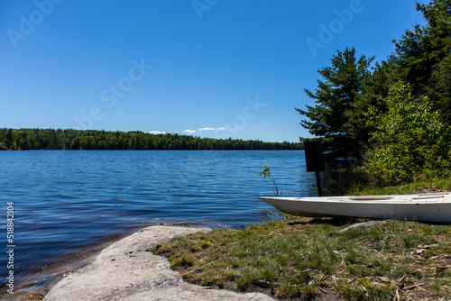 A kayak sits on the edge of a lake at Voyageurs National Park in Minnesota