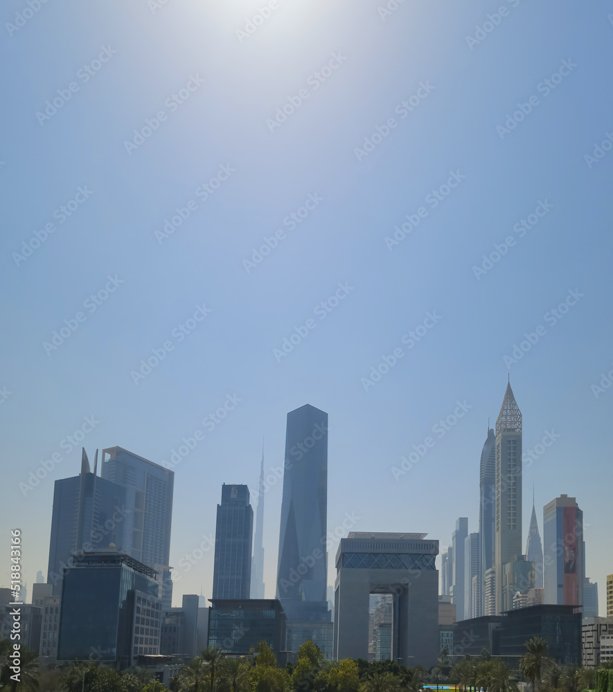 Beautiful Dubai city, bird eye view on majestic cityscape with modern new buildings, daytime panoramic scene, United Arab Emirates