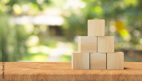 3d Wooden cubes on a wooden surface. 3d information background. 3d rendering