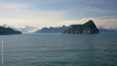 View of the islands and coastline of Resurrection Bay near Seward in Alaska as cruise ship sails away onto Alaskan cruise photo