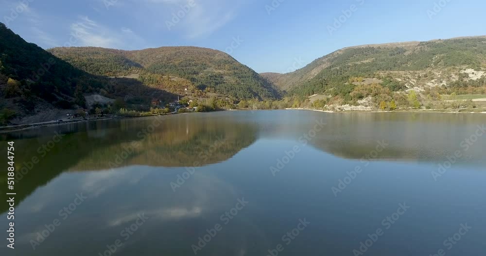 Aerial video of a lake in the mountains in autumn Aerial video of a lake in the mountains in autumn
