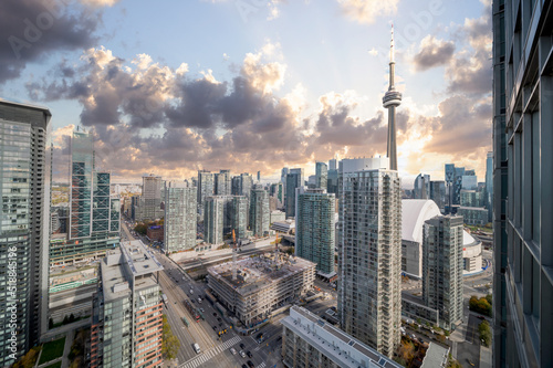 blue skies and cloudsToronto skyline cn tower and condos and Buisness buildings and streets drone view 