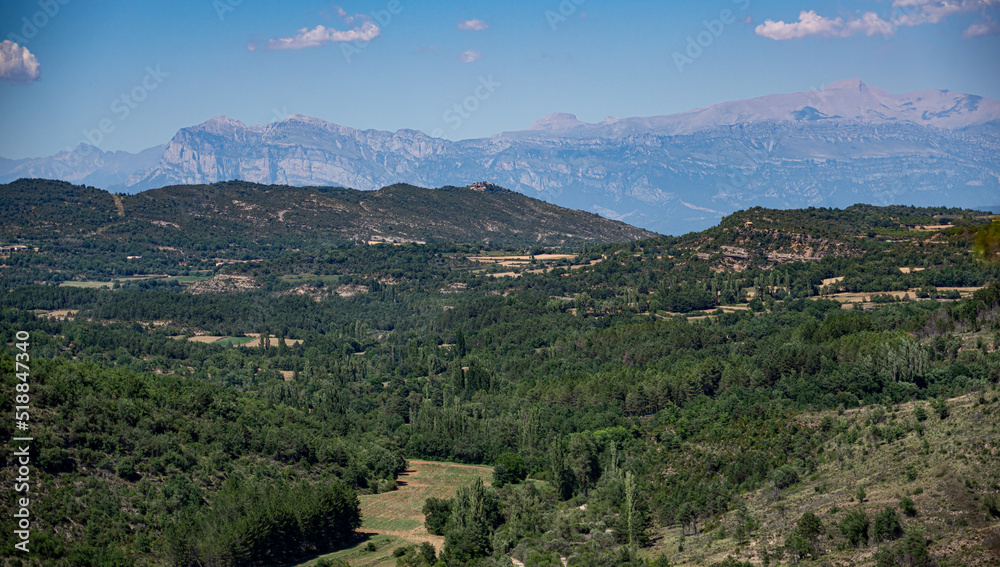 view over a natural park to a mountain range