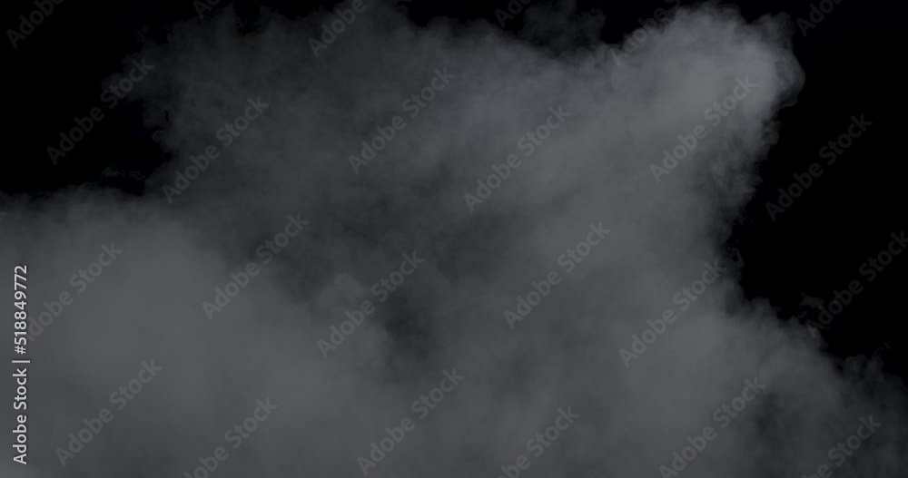 Soft fog haze on dark background. Realistic atmospheric gray smoke on black background. The White Smoke Rises Slowly. Abstract Fog cloud. Filmed with RED camera.