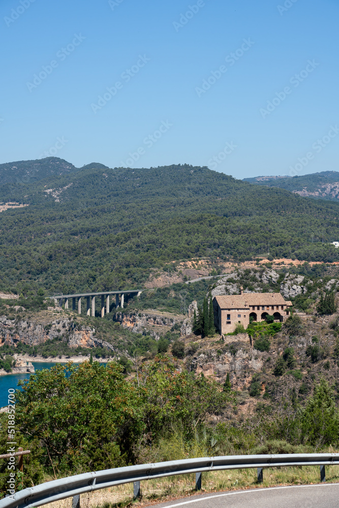 11th Century hermitage with a watch tower, Torreciudad Spain overlooking a distant viaduct