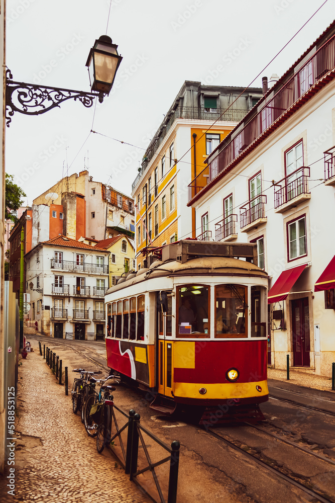 Vintage tram in Alfama historical district of Lisbon, Portugal