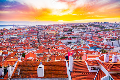 Beautiful panorama of old town and Baixa district in Lisbon city during sunset, seen from Sao Jorge Castle hill, Portugal