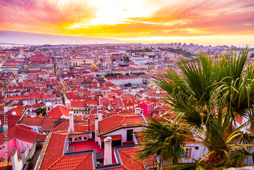 Beautiful panorama of old town and Baixa district in Lisbon city during sunset, seen from Sao Jorge Castle hill, Portugal
