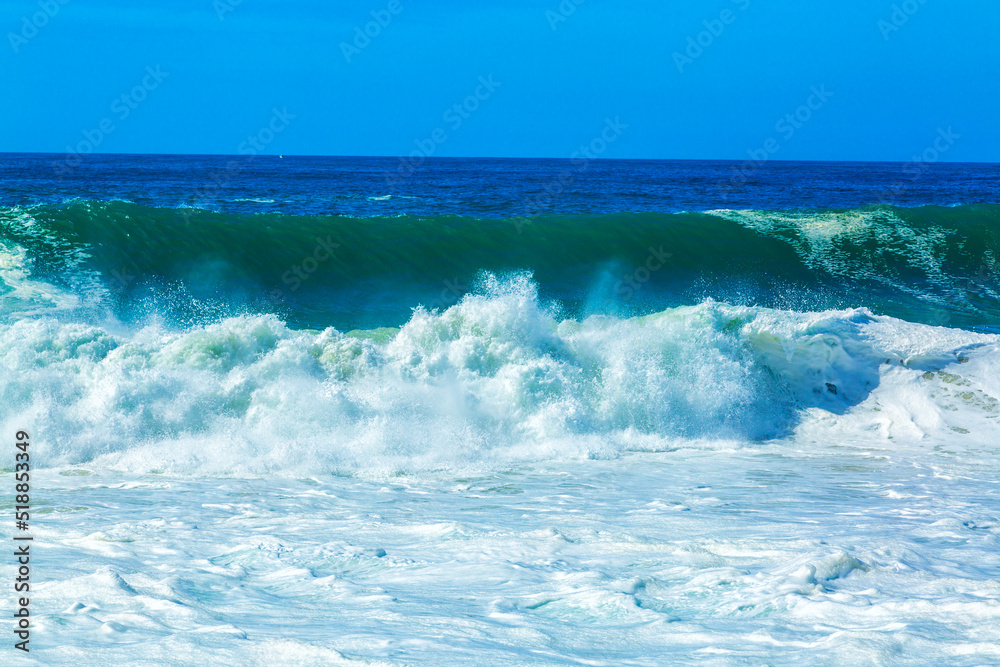 Fototapeta premium Big blue ocean waves with white foam
