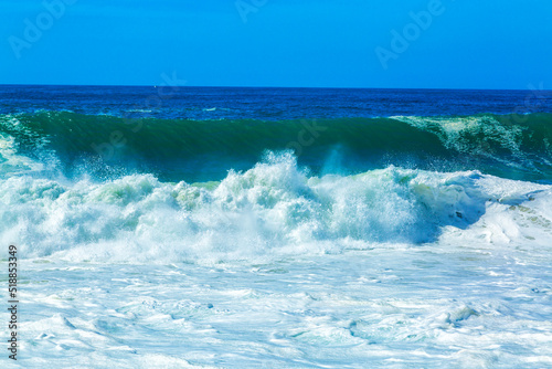 Big blue ocean waves with white foam © Michal Ludwiczak