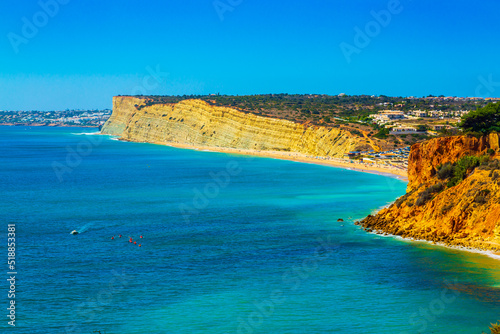 Beautiful sandy ciffs and Porto Mos beach in Algarve region neer Lagos city, Portugal photo
