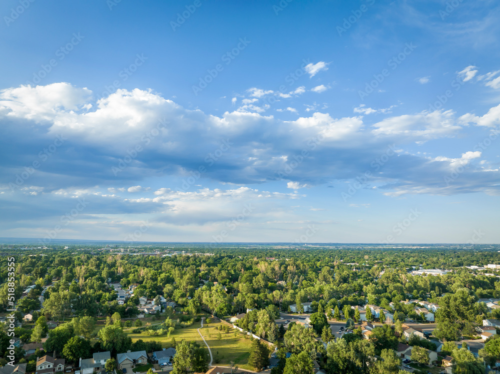summer afternoon over residential area and park of Fort Collins in northern Colorado, aerial view