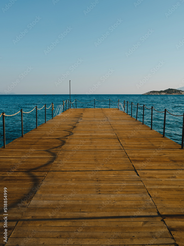 old wooden pier and blue sea scenery old wooden pier and blue sea scenery