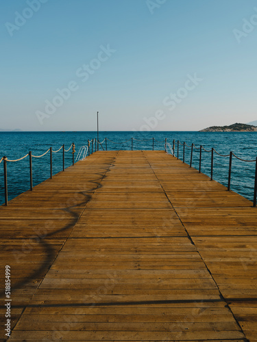old wooden pier and blue sea scenery