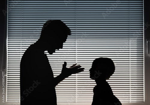 Fotografie Frustrated, angry father screaming at his son