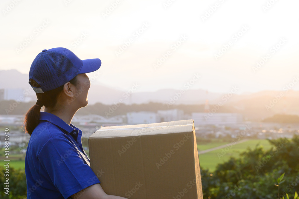 Image of a mover looking out over the city