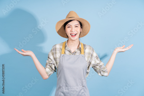 Portrait of young Asian female farmer