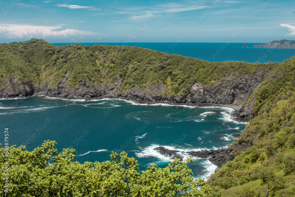 coastal landscape with reefs and vegetation on an island in Costa Rica