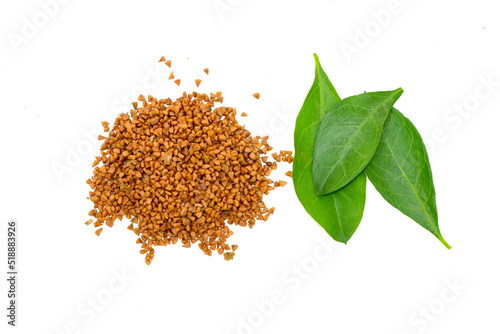 Mehendi or henna leaves and powder heap isolated on white background, Lawsonia inermis powder, Herbs for hair.