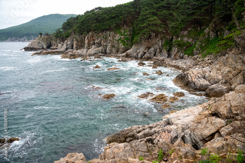 Cape Gamow. Vityaz Bay. Turquoise sea photo