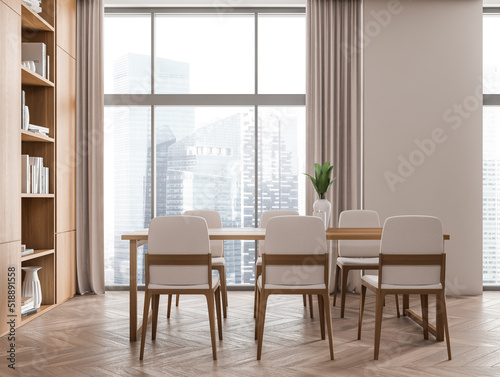 Eating room interior with chairs and shelf with decoration, panoramic window