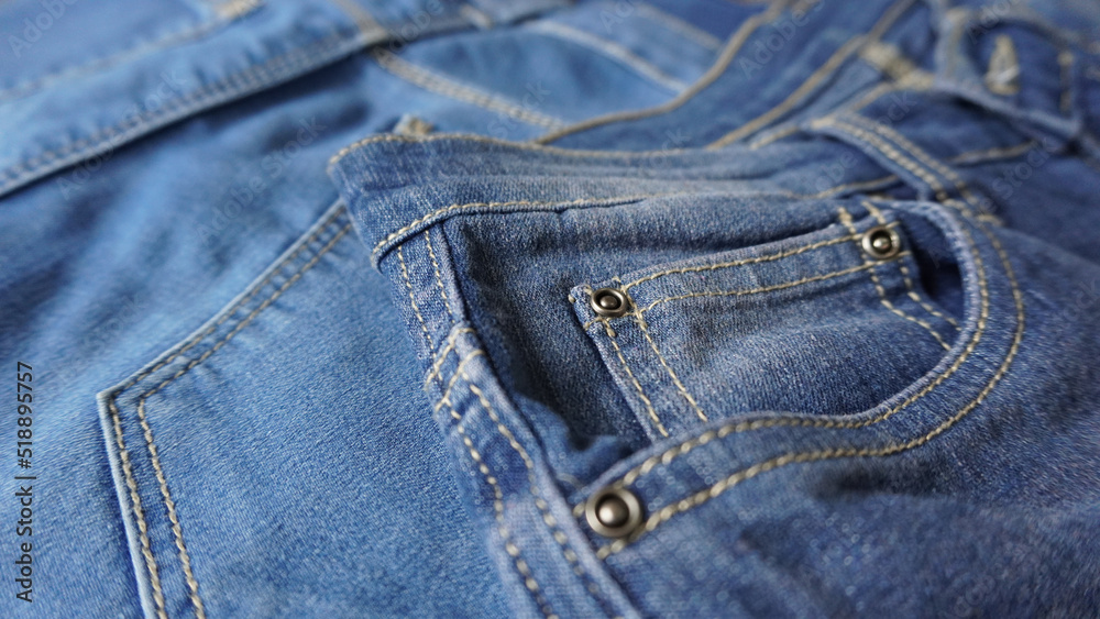 Close up of denim jeans coin pocket or watch pocket Close up of denim jeans coin pocket or watch pocket