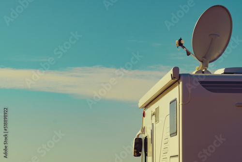 Leinwand Poster Satellite dish on roof of caravan