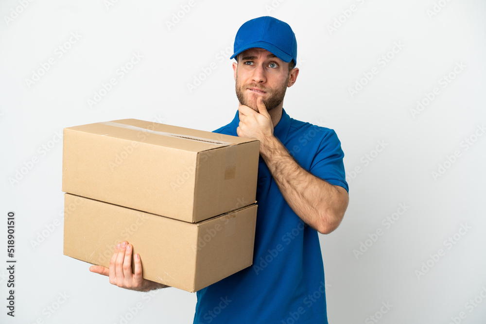 Delivery man over isolated white background having doubts and thinking Delivery man over isolated white background having doubts and thinking