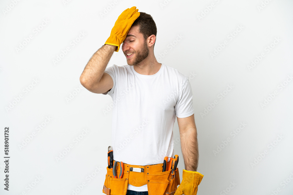Young electrician man over isolated white wall has realized something and intending the solution