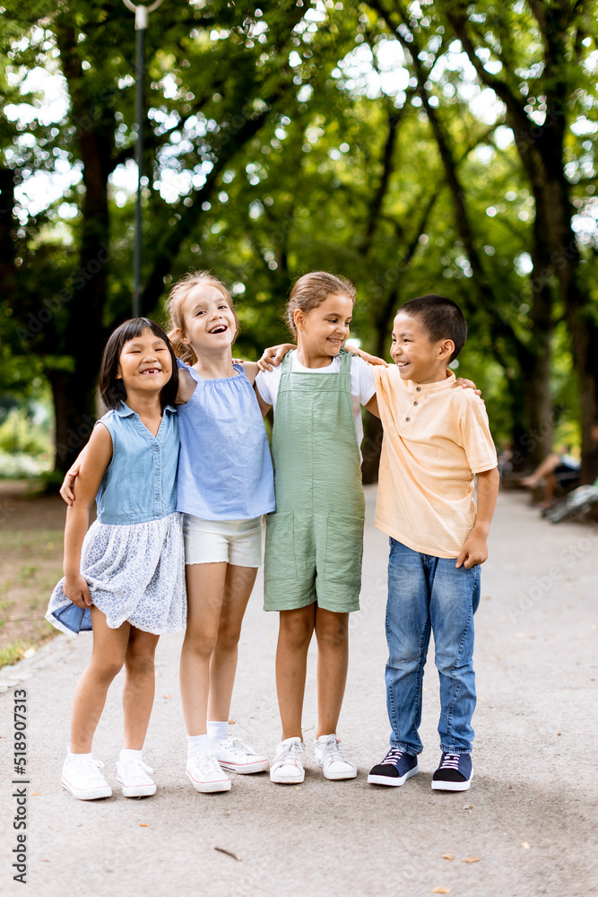Group of asian and caucasian kids having fun in the park Group of asian and caucasian kids having fun in the park