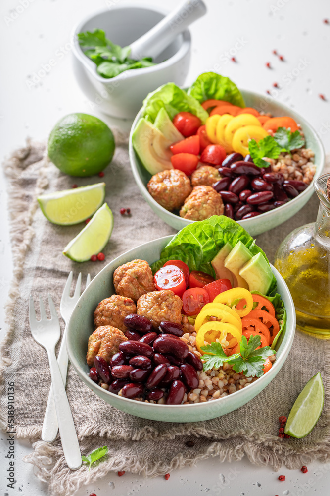 Spicy Mexican salad as meal with meat and groats.