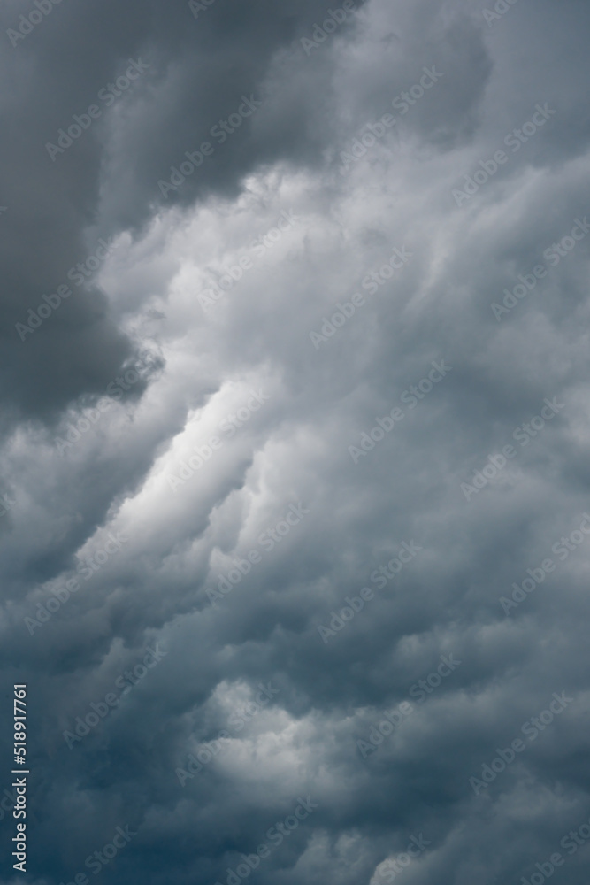 dramatic cloudy dark clouds before a storm. deep blue and grey heavy clouds. weather forecast
