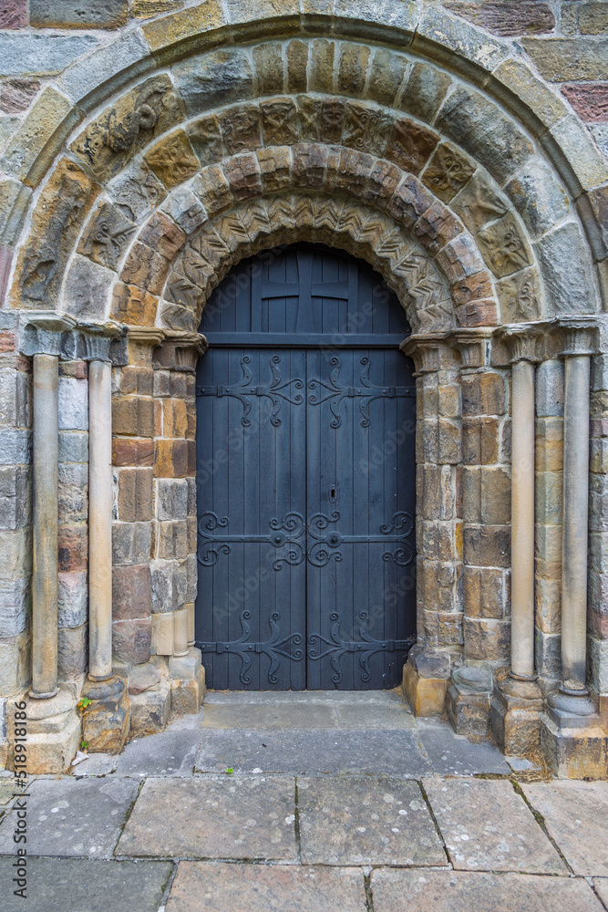 Black classic door to the Saint Marys Church, Kirkby Lonsdale. Cumbria, England.