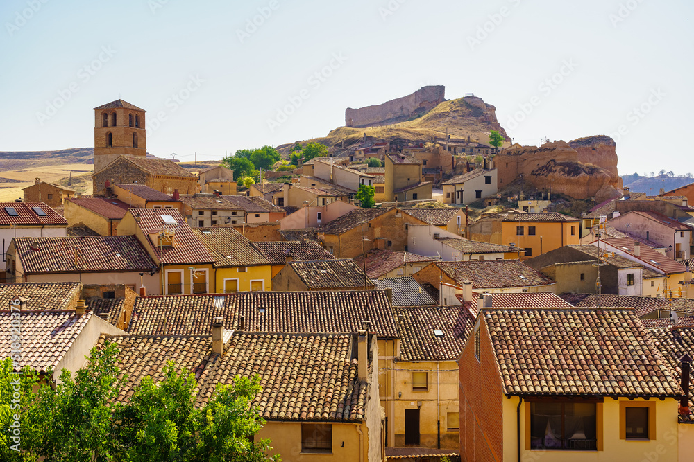 Panoramic medieval village with houses dug into the rock of the mountain, San Esteban de Gormaz.