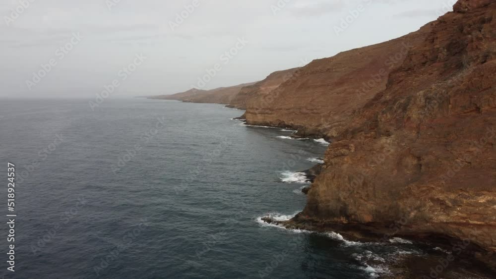 endless rocky cliffs on the coast of Fuerteventura Spain endless rocky cliffs on the coast of Fuerteventura Spain