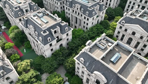 Houses in European style in the city. Drone aerial view. Rows of buildings of Victoria era style in the downtown area in Shanghai China.  Economy business, house development  concept b-roll footage.