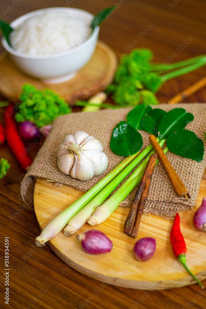 Spices and condiments on a wooden table