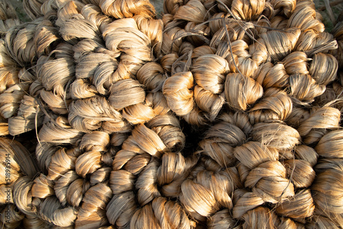 thick brown bundle of raw jute fiber Texture Background