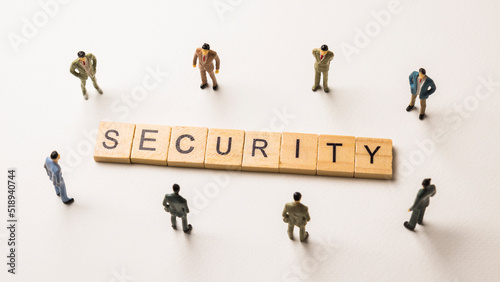 businessman figures at security words