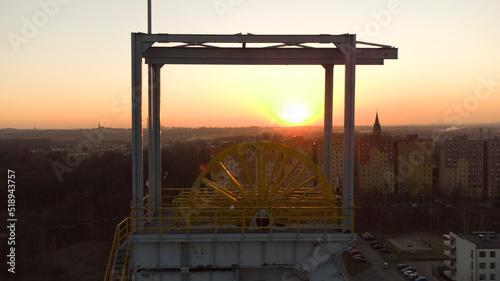 Wieża wyciągowa dawnej Kopalni Siemianowice na tle zachodzącego słońca. Szyb Krysian. Park Tradycji. photo