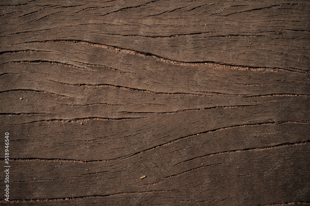 Dark wooden natural background, brown planks texture.
