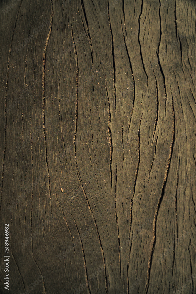 Dark wooden natural background, brown planks texture.