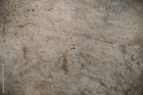 Obraz na płótnie Destroyed cracked wall background, brown light texture, paint streaks. w salonie