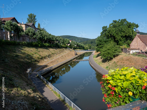 marne rhine canal in french town of saverne under blue summer sky