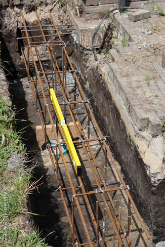 Reinforcement steel frame close up photo. Construction project in details. 